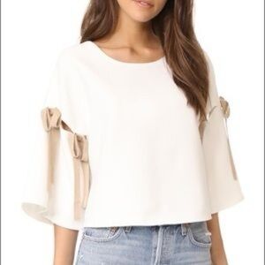 Cinq a Sept Elegant White Blouse with Tan Bow cut out sleeves